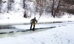 Lustiges Video - Überquerungskünstler am gefrorenen Fluss